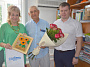 Глава Администрации района Ольга Мельникова поздравила с 65-летним юбилеем Петра Пузанова